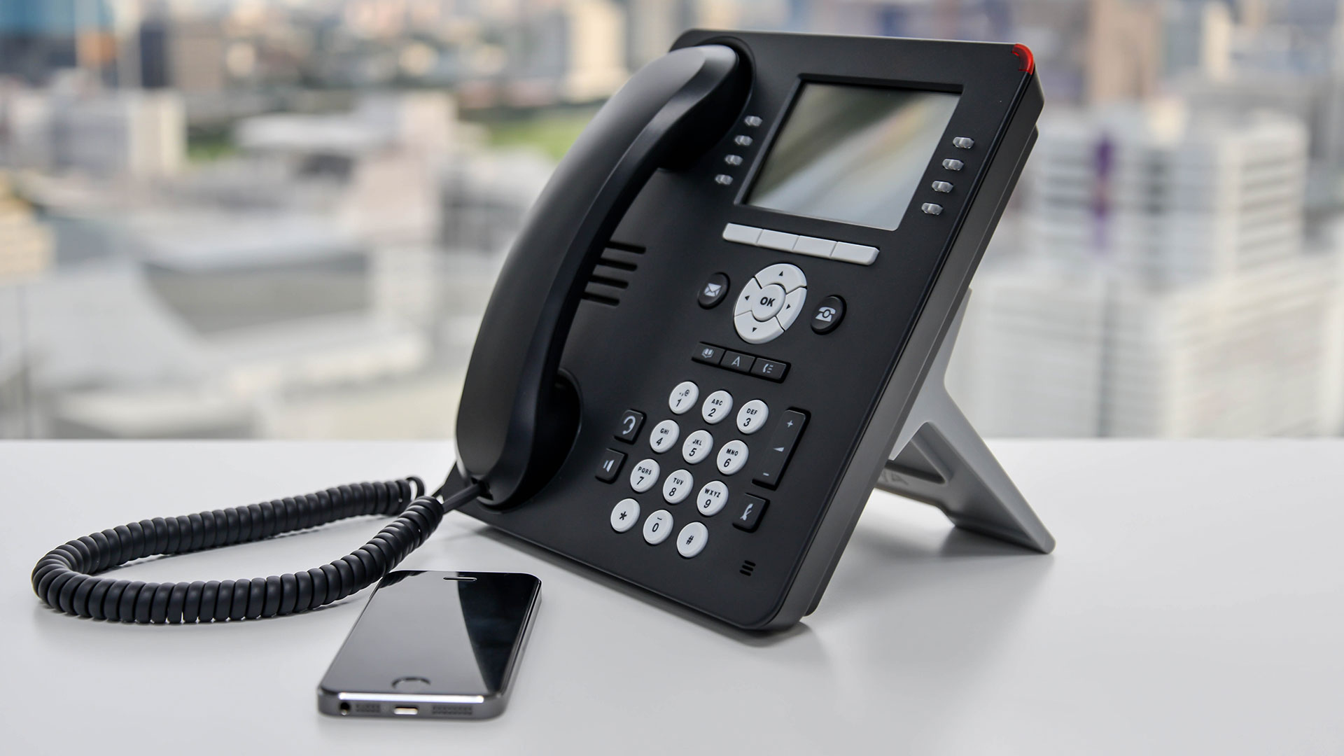 Mobil og trykknap telefon