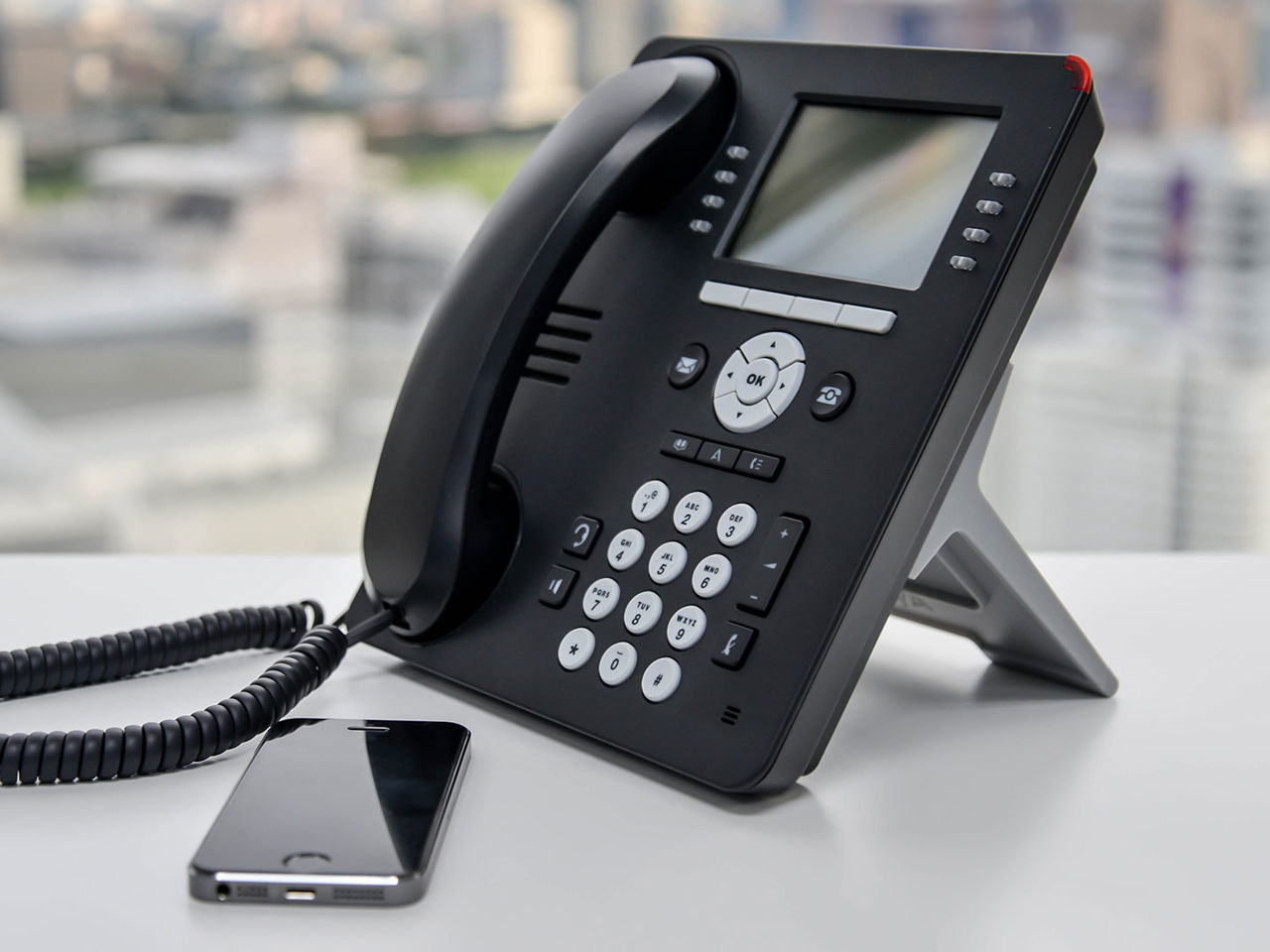 Mobil og trykknap telefon