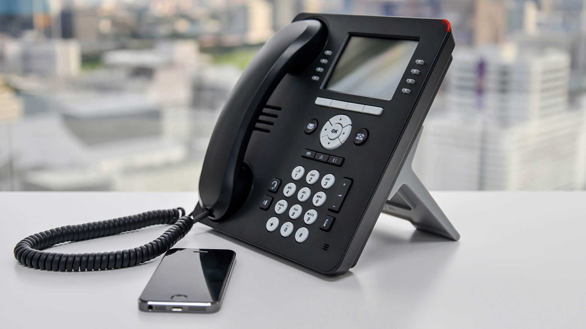 Mobil og trykknap telefon