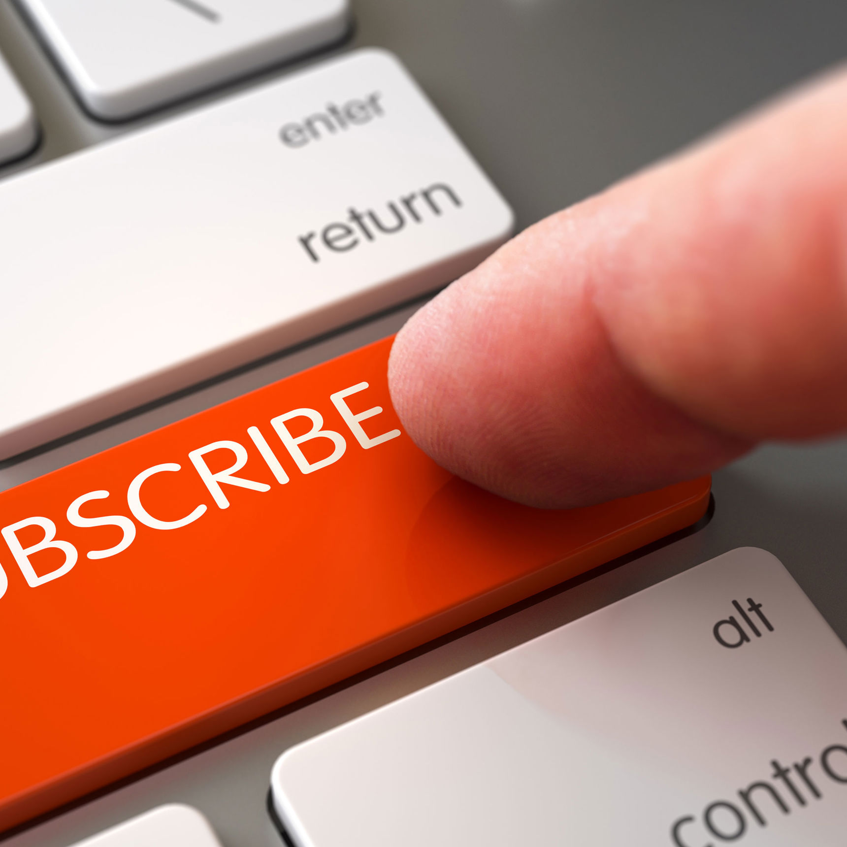 Tastatur med en rød 'Subscribe' knap // Foto: Colourbox